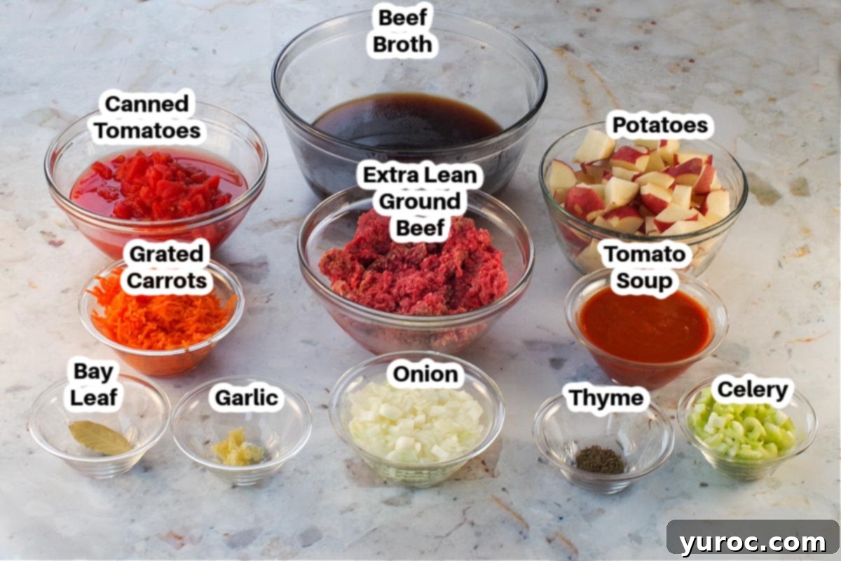 Homestyle Hamburger Potato Soup 4 Individual ingredients for Hamburger Potato Soup laid out in glass bowls, clearly labelled for easy preparation.