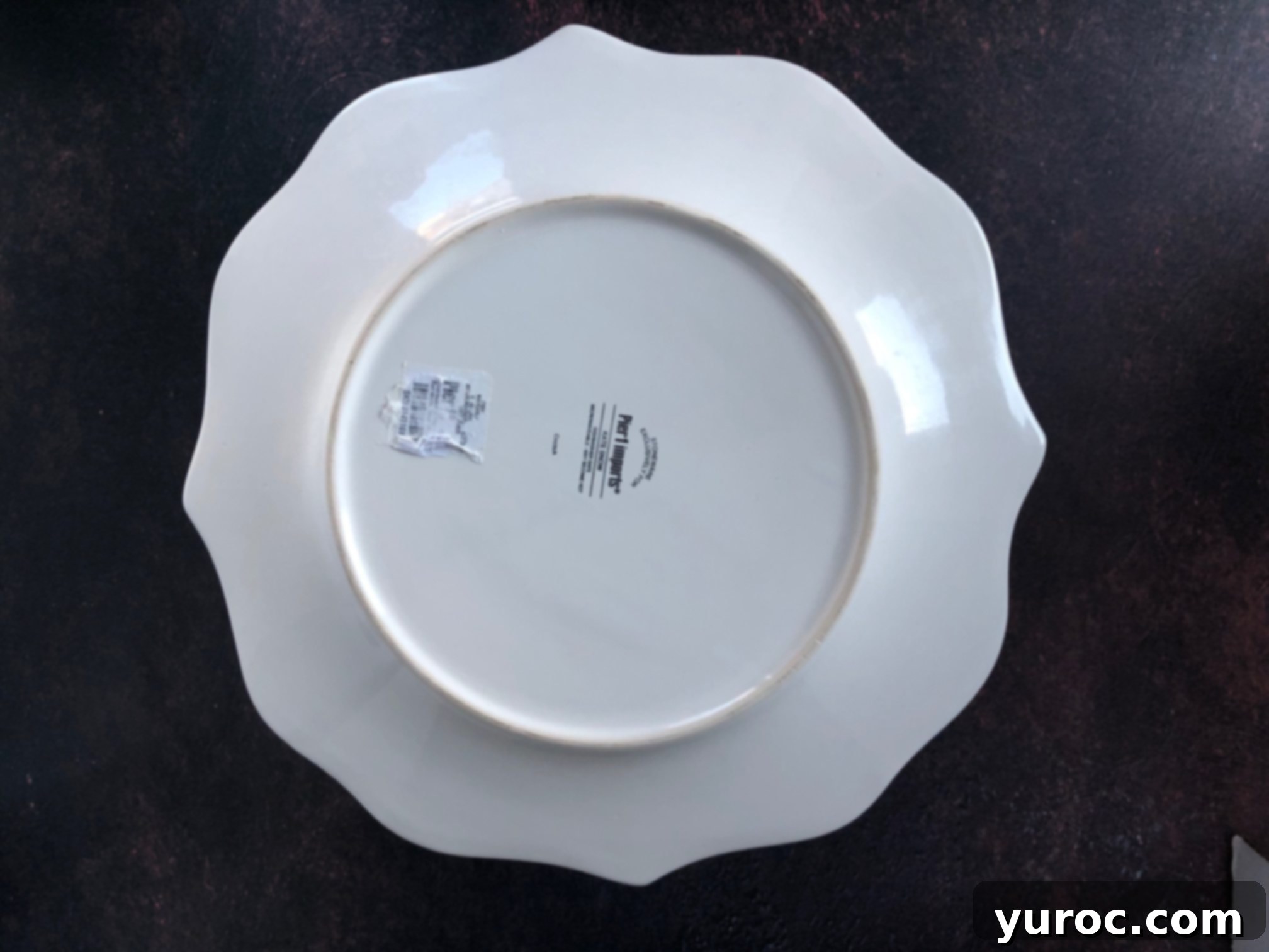 Plate on top of cake in preparation to flip