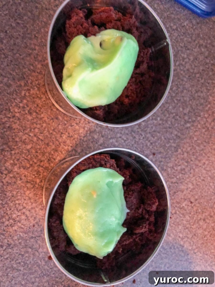pudding added on top of cake in containers