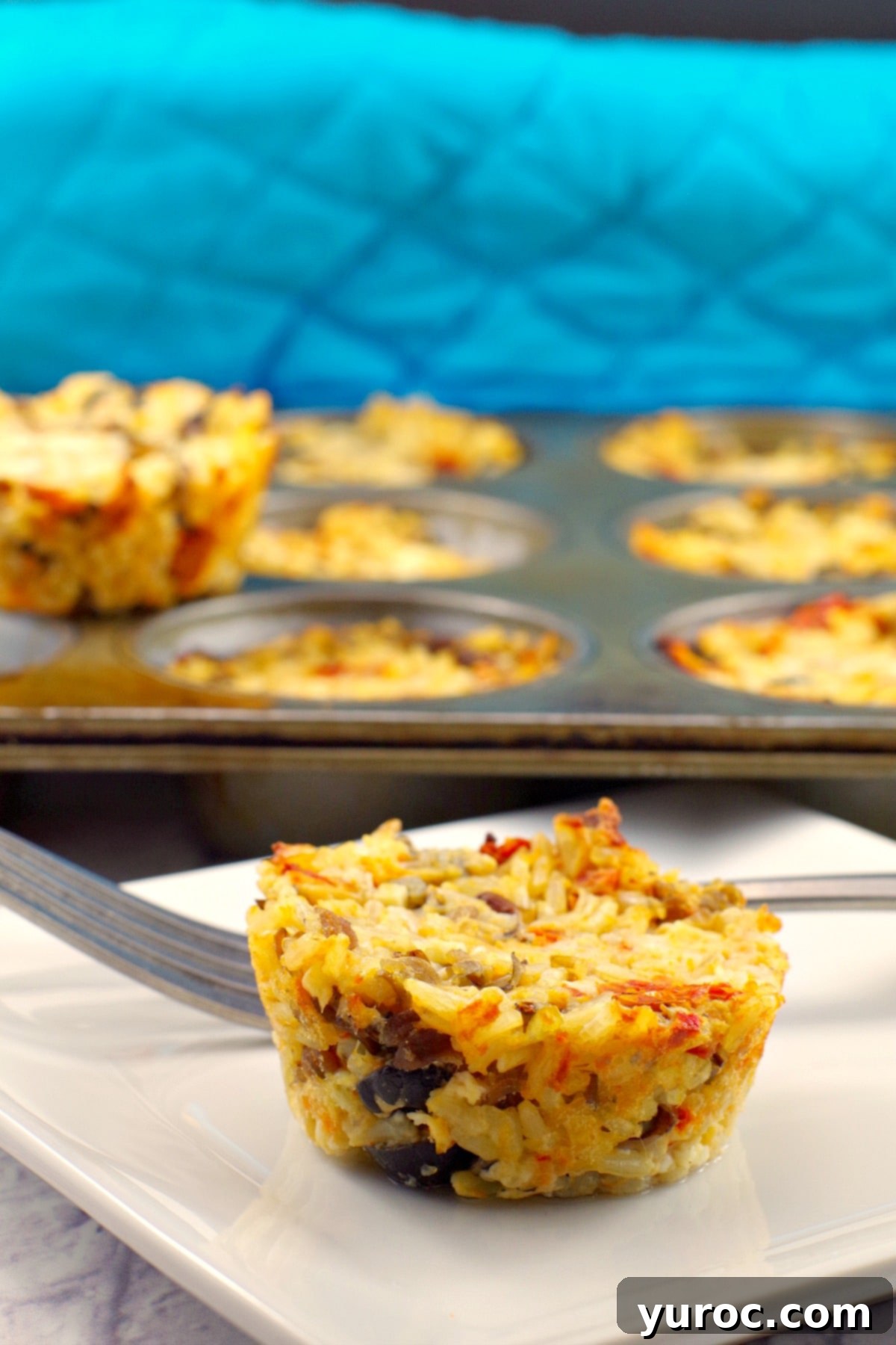 Zesty Mediterranean Chicken Rice Cups 3 Two lunchboxes containing Mediterranean chicken rice cups, fruit, and other snacks, showcasing easy meal prep