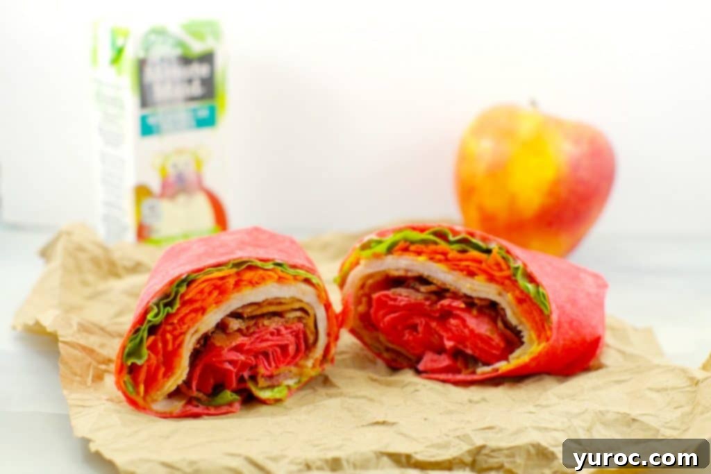 Delicious Turkey Bacon Ranch Wrap, perfectly rolled for a quick meal, from Foodmeanderings.com