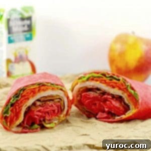 Ultimate Turkey Bacon Ranch Wrap 11 turkey club ranch wrap on brown paper