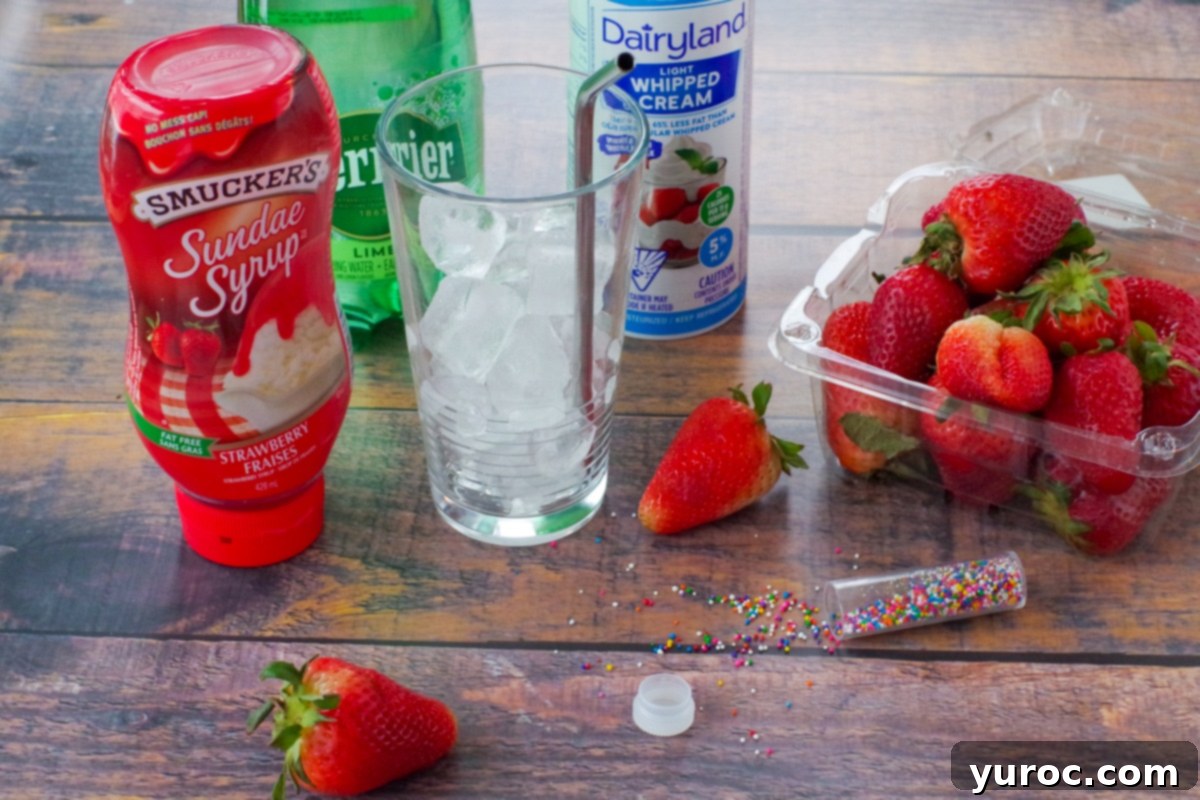 Strawberry Italian Bliss 3 ingredients for Italian soda on a brown wooden panelled surface