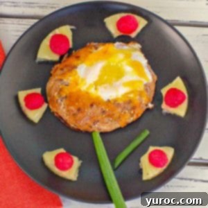 egg in a hole with pineapple, raspberry and green onion (made to look like a flower)