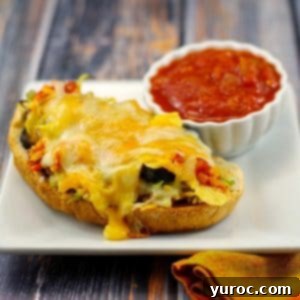Mexican Tuna Melt on a white plate with a dish of salsa in a small white bowl