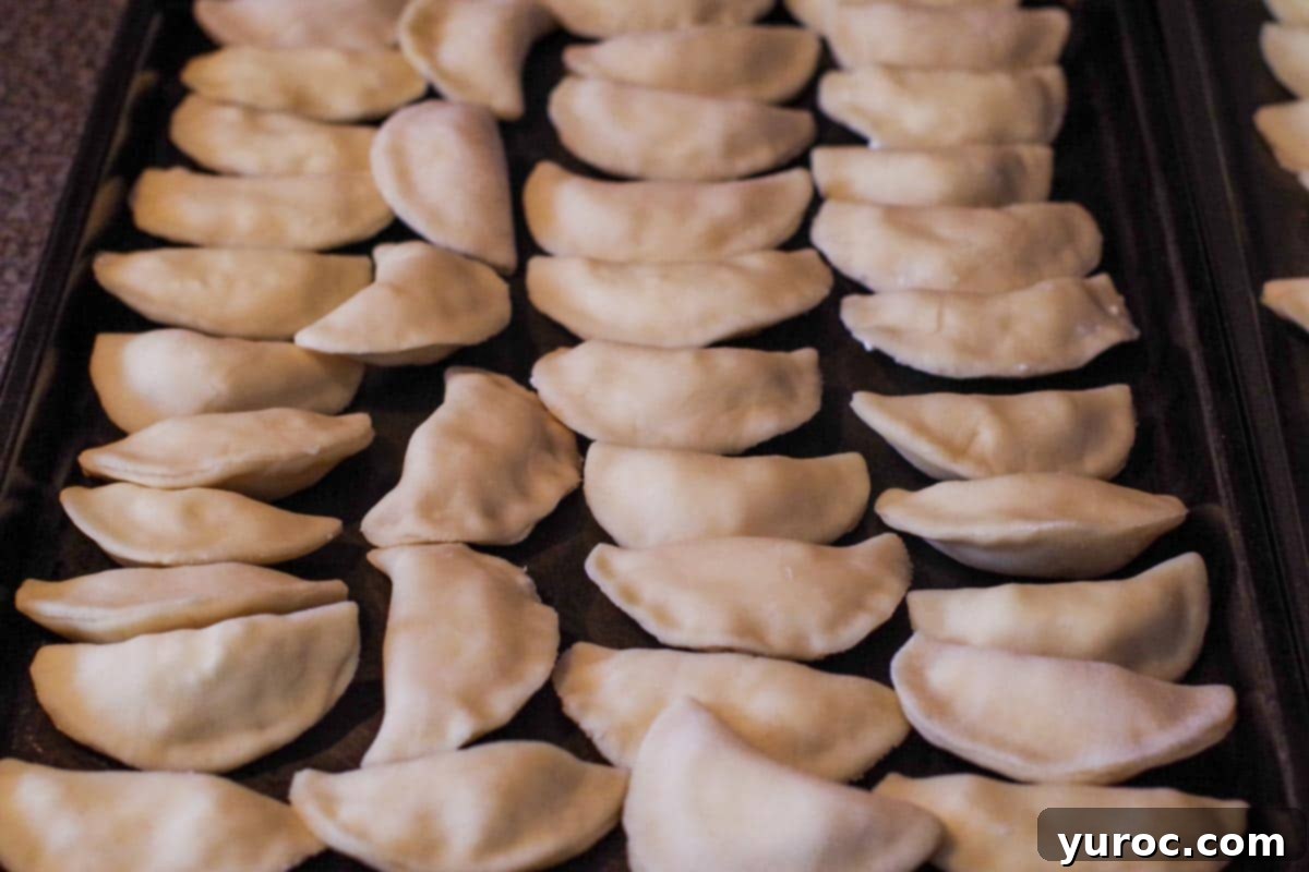 perogies on baking sheet