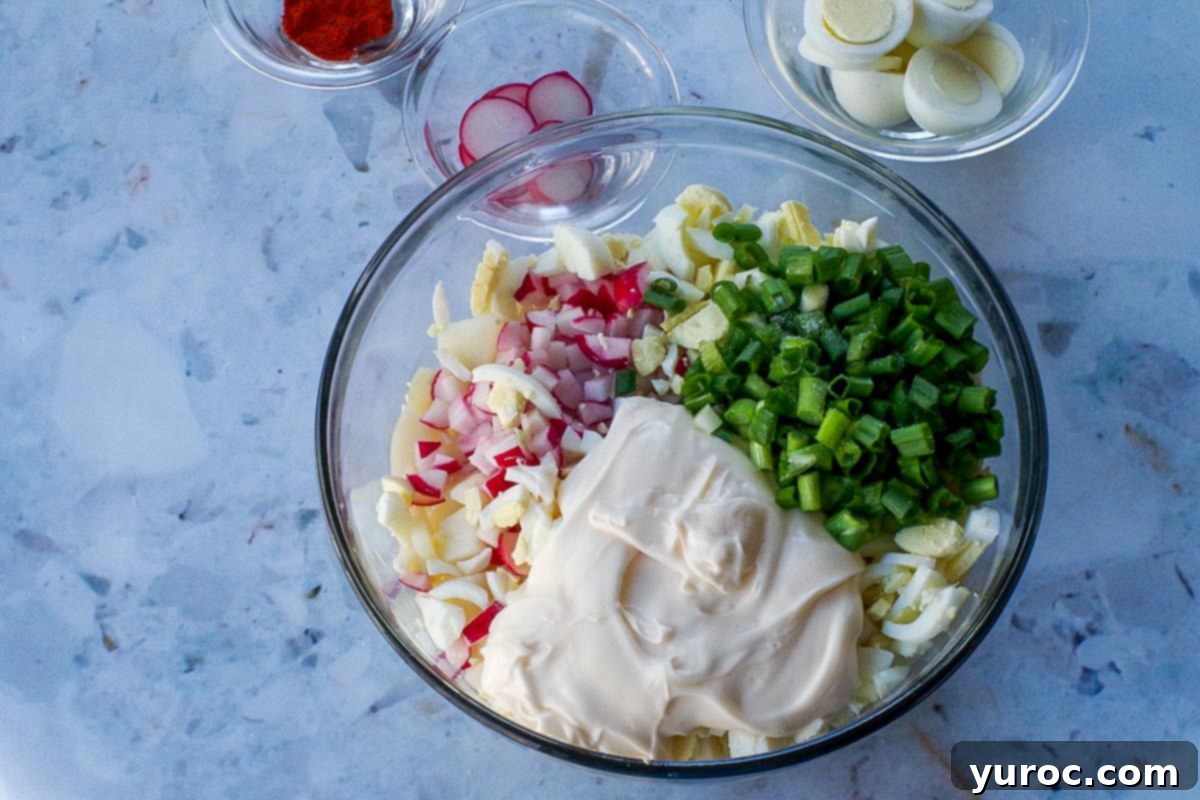 All ingredients (except garnishes) in large glass bowl).