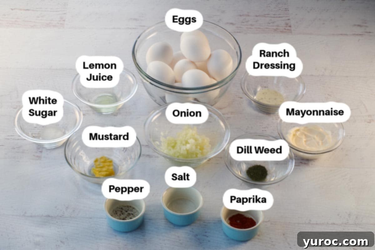 Ingredients in Dill Weed Deviled Eggs in glass bowls, labelled.
