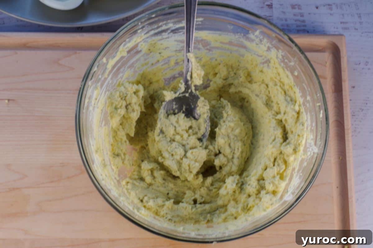 Egg yolks mixed with other deviled egg filling ingredients.