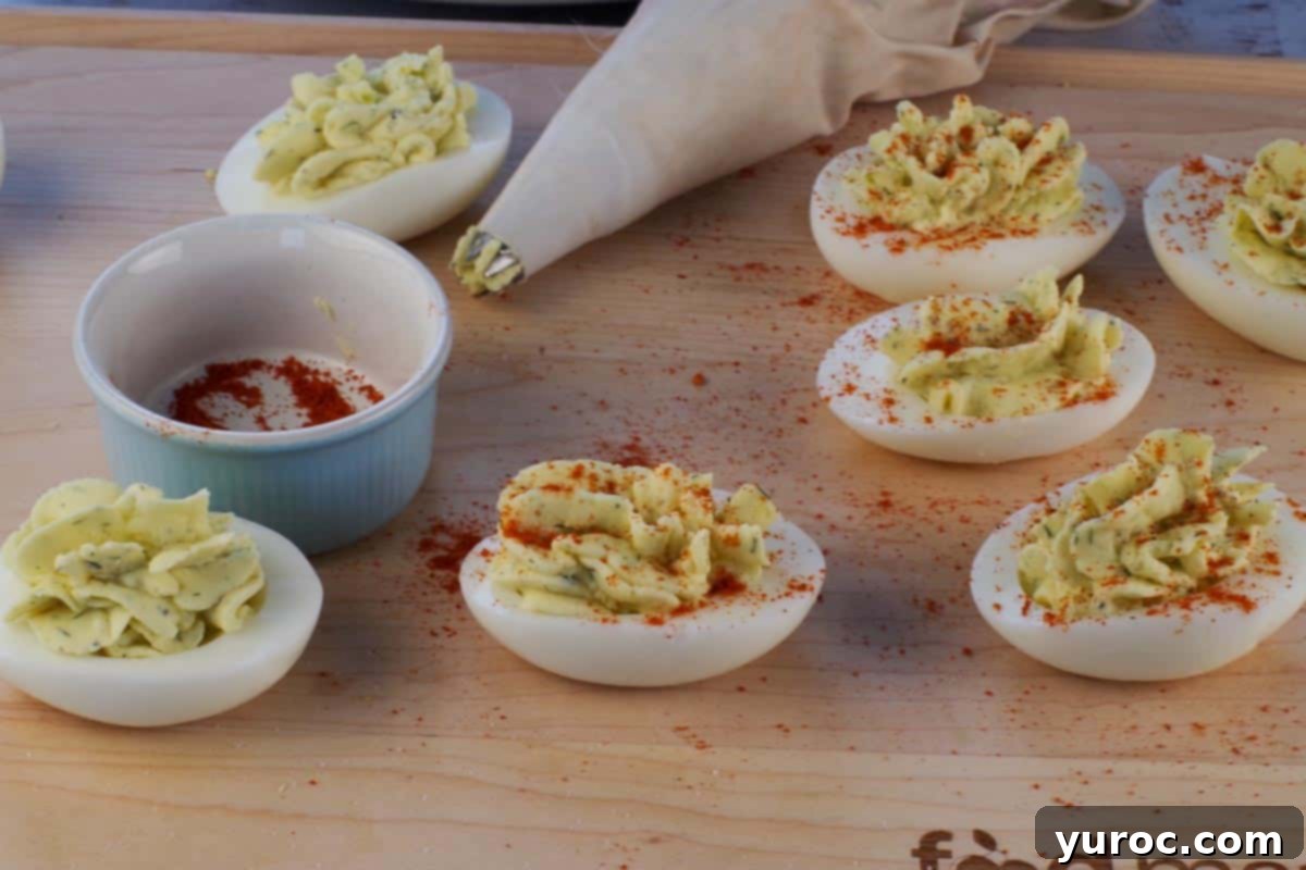 Deviled Eggs sprinkled with paprika.