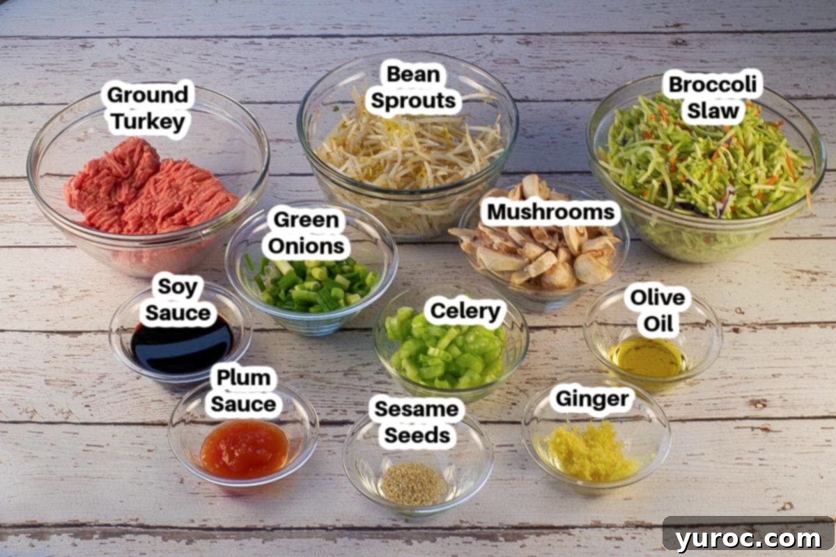 WW Egg roll in a bowl ingredients in glass bowls, labelled.