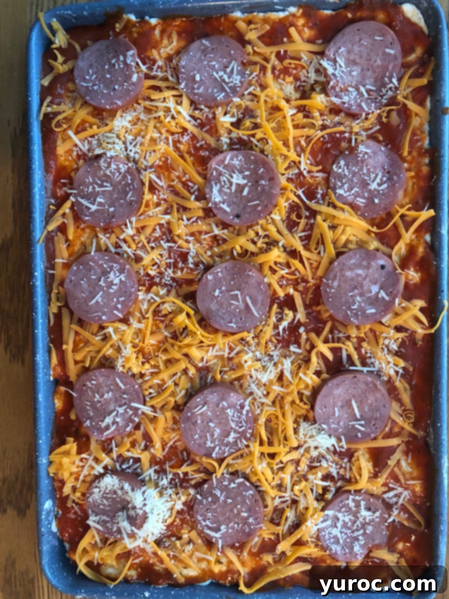 Parmesan cheese added to pizza dippers
