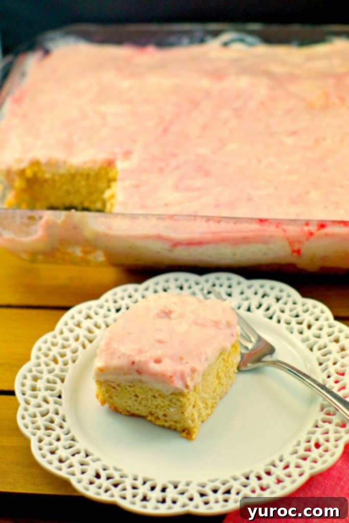 Tall slice of Slightly Skinny Strawberry Blondie Bars