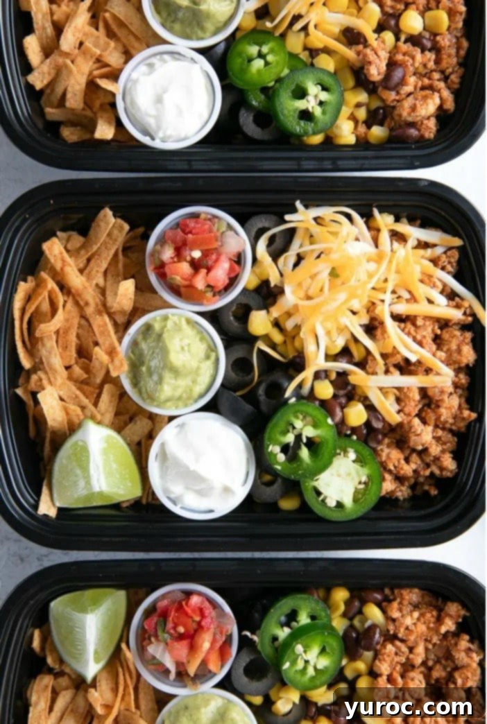 15 No-Prep Healthy School Lunches for Teens 5 Taco Salad Meal Prep Bowls with healthy ground turkey, black beans, corn, cheese, and lettuce.