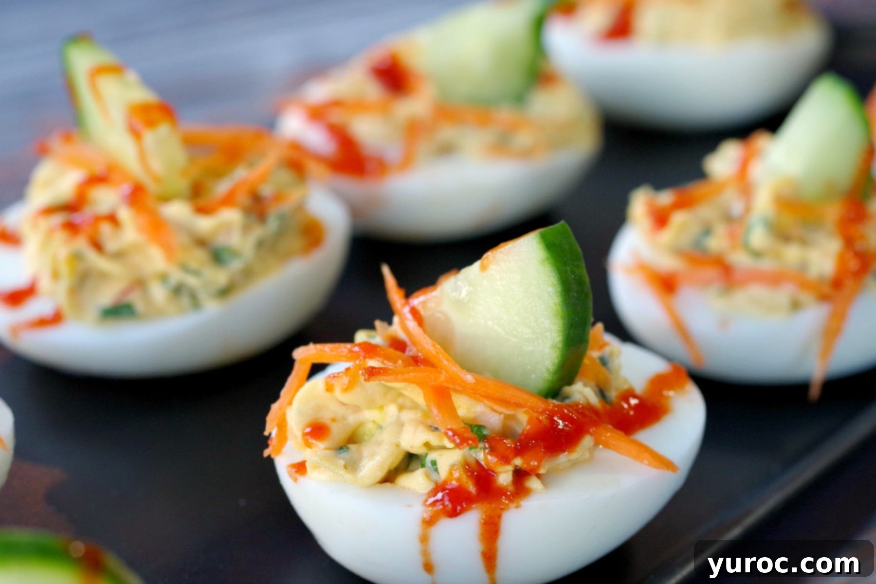 close up of Banh Mi Devilled egg on black try