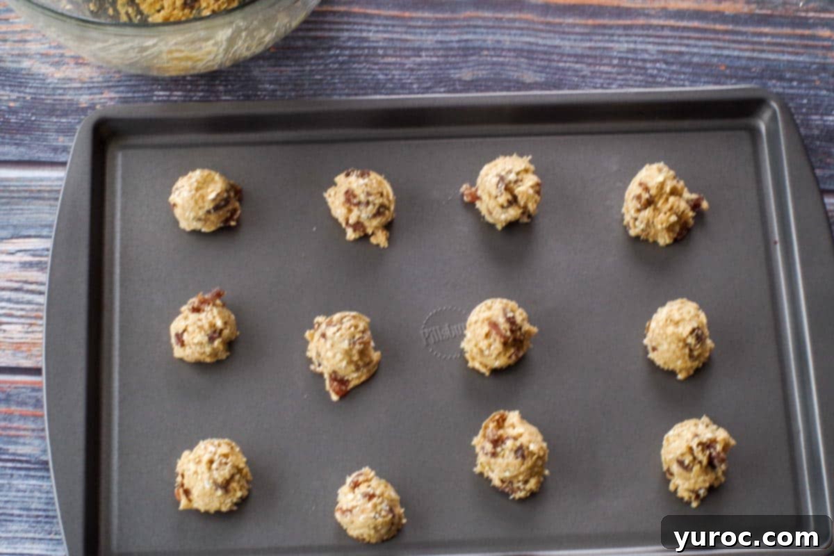 More cookie dough on a cookie sheet, ready for baking.