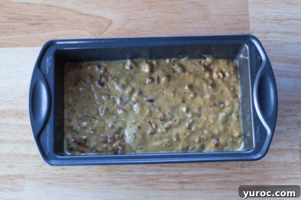 Date nut loaf batter in prepared loaf pan