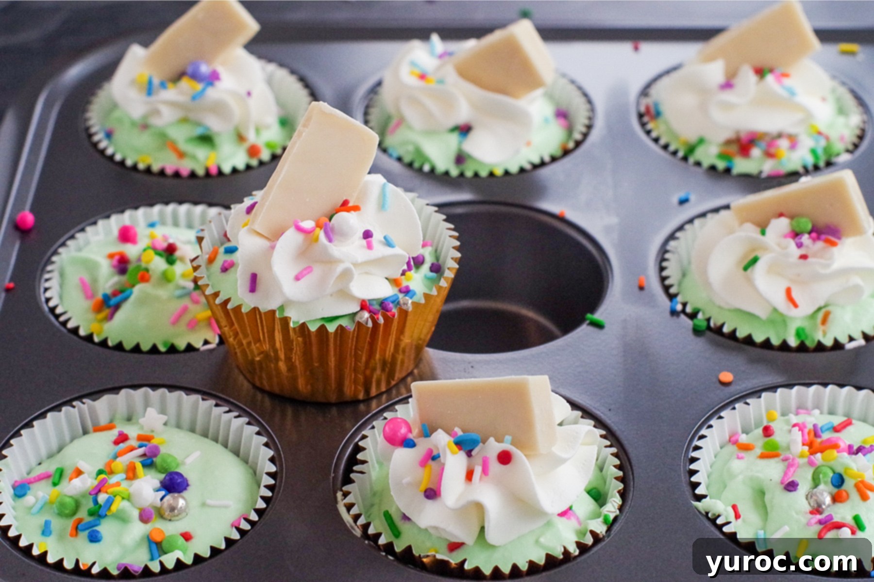 Effortless No-Churn Ice Cream Cupcakes 2 no churn ice cream cupcake sitting on muffin tin