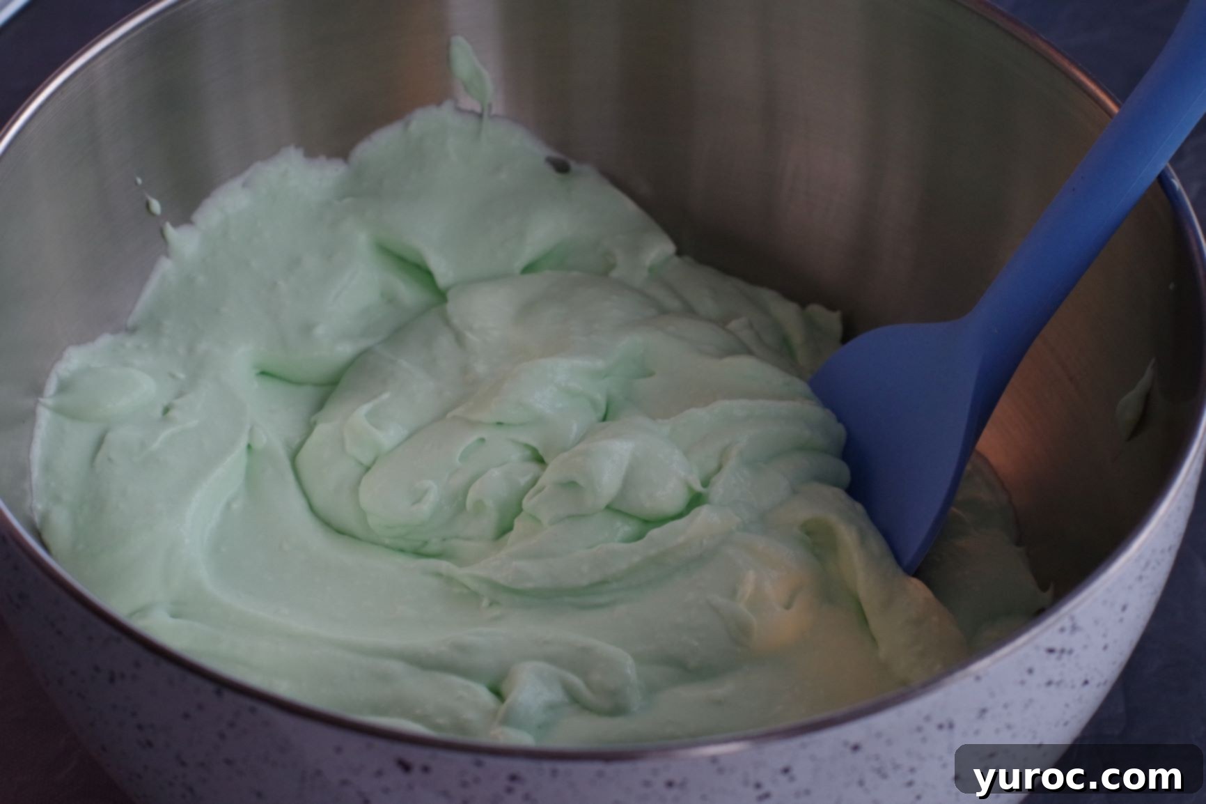Effortless No-Churn Ice Cream Cupcakes 5 green whipped cream/condensed milk mixture