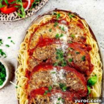 Meatloaf on a bed of pasta.