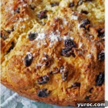 Freshly baked Irish Soda Bread, golden brown and rustic.