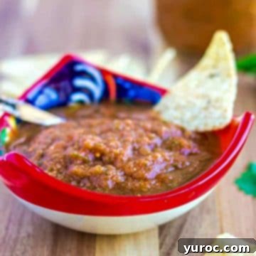 Thai Salsa Roja in a red and white bowl with a blue pattern.