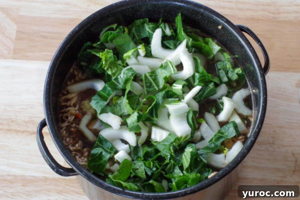 remaining ingredients, including bok choy, added to pot